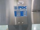 Used PDC Model 60ER shrink sleeve labeler. Capable of speeds from 50 to 130 containers per minute. Sleeve range: (Diam) .375