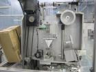 Used PDC Model 60ER shrink sleeve labeler. Capable of speeds from 50 to 130 containers per minute. Sleeve range: (Diam) .375
