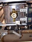 Used TriPack LSA-160 Automatic Shrink Sleeve Labeler Applicator / Neck Bander. Capable of speeds up to 100 BPM. Layflat width 40mm-170mm. Product Diameter 1