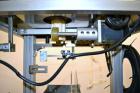 Used TriPack LSA-160 Automatic Shrink Sleeve Labeler Applicator / Neck Bander. Capable of speeds up to 100 BPM. Layflat width 40mm-170mm. Product Diameter 1