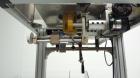 Used TriPack LSA-160 Automatic Shrink Sleeve Labeler Applicator / Neck Bander. Capable of speeds up to 100 BPM. Layflat width 40mm-170mm. Product Diameter 1