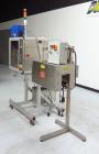 Used TriPack LSA-160 Automatic Shrink Sleeve Labeler Applicator / Neck Bander. Capable of speeds up to 100 BPM. Layflat width 40mm-170mm. Product Diameter 1