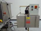 Used TriPack LSA-160 Automatic Shrink Sleeve Labeler Applicator / Neck Bander. Capable of speeds up to 100 BPM. Layflat width 40mm-170mm. Product Diameter 1