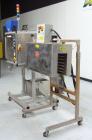 Used TriPack LSA-160 Automatic Shrink Sleeve Labeler Applicator / Neck Bander. Capable of speeds up to 100 BPM. Layflat width 40mm-170mm. Product Diameter 1