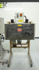 Used TriPack LSA-160 Automatic Shrink Sleeve Labeler Applicator / Neck Bander. Capable of speeds up to 100 BPM. Layflat width 40mm-170mm. Product Diameter 1