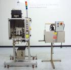 Used TriPack LSA-160 Automatic Shrink Sleeve Labeler Applicator / Neck Bander. Capable of speeds up to 100 BPM. Layflat width 40mm-170mm. Product diameter 25mm to 1