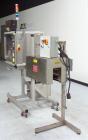Used TriPack LSA-160 Automatic Shrink Sleeve Labeler Applicator / Neck Bander. Capable of speeds up to 100 BPM. Layflat width 40mm-170mm. Product diameter 25mm to 1