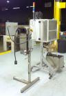 Used TriPack LSA-160 Automatic Shrink Sleeve Labeler Applicator / Neck Bander. Capable of speeds up to 100 BPM. Layflat width 40mm-170mm. Product diameter 25mm to 1
