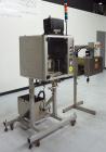 Used TriPack LSA-160 Automatic Shrink Sleeve Labeler Applicator / Neck Bander. Capable of speeds up to 100 BPM. Layflat width 40mm-170mm. Product diameter 25mm to 1