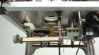 Used TriPack LSA-160 Automatic Shrink Sleeve Labeler Applicator / Neck Bander. Capable of speeds up to 100 BPM. Layflat width 40mm-170mm. Product diameter 25mm to 1