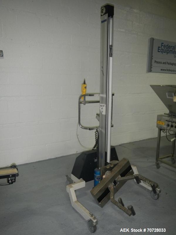 Used TAWI MAXILIFT drum handler, model PRO200, 265# max weight, 84" max hight, with rotations and lift controls.