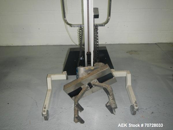 Used TAWI MAXILIFT drum handler, model PRO200, 265# max weight, 84" max hight, with rotations and lift controls.