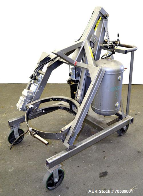 Used Drum Runner Material Handling Drum Lift-Carry-Rotate-Pour, Model 4600A-H, carbon steel, 800 pound drum capacity.  Air lift and tilt with holding tank.  Designed for plastic, steel, and fiber dru...