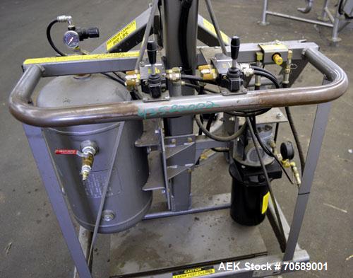 Used Drum Runner Material Handling Drum Lift-Carry-Rotate-Pour, Model 4600A-H, carbon steel, 800 pound drum capacity.  Air lift and tilt with holding tank.  Designed for plastic, steel, and fiber dru...