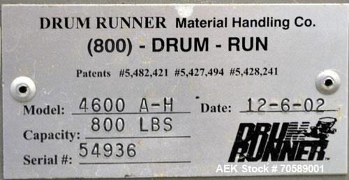 Used Drum Runner Material Handling Drum Lift-Carry-Rotate-Pour, Model 4600A-H, carbon steel, 800 pound drum capacity.  Air lift and tilt with holding tank.  Designed for plastic, steel, and fiber dru...