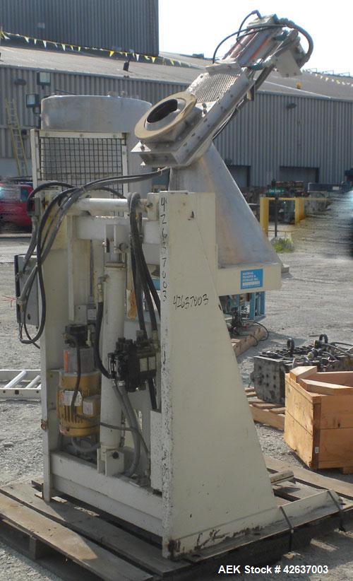 Used Material Transfer & Storage Lift and Dump Drum Discharger, Carbon Steel. 2 HP, 3/60/230/460 Volt, 1150 RPM hydraulic motor. 304 Stainless steel drum chute with a vortex air operated slide gate v...