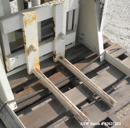 Used Material Transfer & Storage Lift and Dump Drum Discharger, Carbon Steel. 2 HP, 3/60/230/460 Volt, 1150 RPM hydraulic motor. 304 Stainless steel drum chute with a vortex air operated slide gate v...