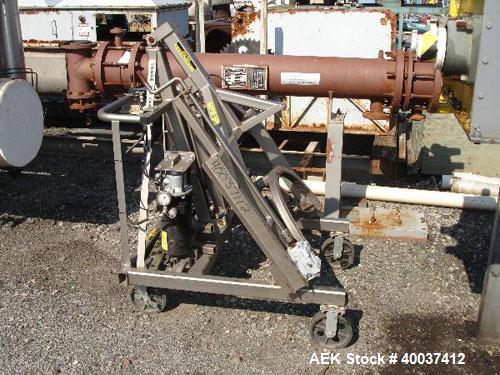 Used Material Handling Drum Runner, Model 4600A/H, carbon steel. 800 pound drum capacity, air/oil lift, manual tilt. Drum diameters 18" to 23 1/2", drum height 29" to 35", pour height 84". Mounted on...