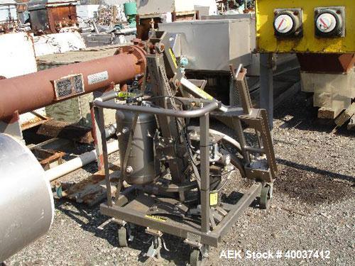Used Material Handling Drum Runner, Model 4600A/H, carbon steel. 800 pound drum capacity, air/oil lift, manual tilt. Drum diameters 18" to 23 1/2", drum height 29" to 35", pour height 84". Mounted on...