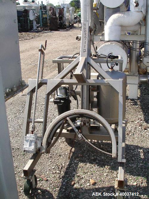 Used Material Handling Drum Runner, Model 4600A/H, carbon steel. 800 pound drum capacity, air/oil lift, manual tilt. Drum diameters 18" to 23 1/2", drum height 29" to 35", pour height 84". Mounted on...