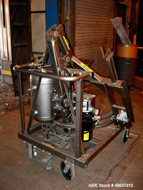 Used Material Handling Drum Runner, Model 4600A/H, carbon steel. 800 pound drum capacity, air/oil lift, manual tilt. Drum diameters 18" to 23 1/2", drum height 29" to 35", pour height 84". Mounted on...