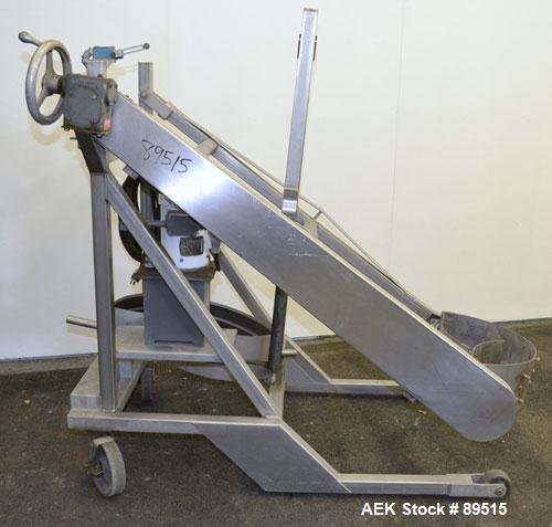 Used Sterling Fleischman Hydraulic Drum Dumper, 304 Stainless Steel. Approximate 750 pound capacity. 3/4 hp, 1/60/115/230 volt, 1725 rpm motor. Manual hand crank drum tilt. Unit mounted on casters.
