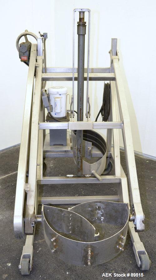 Used Sterling Fleischman Hydraulic Drum Dumper, 304 Stainless Steel. Approximate 750 pound capacity. 3/4 hp, 1/60/115/230 volt, 1725 rpm motor. Manual hand crank drum tilt. Unit mounted on casters.