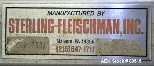 Used Sterling Fleischman Hydraulic Drum Dumper, 304 Stainless Steel. Approximate 750 pound capacity. 3/4 hp, 1/60/115/230 volt, 1725 rpm motor. Manual hand crank drum tilt. Unit mounted on casters.