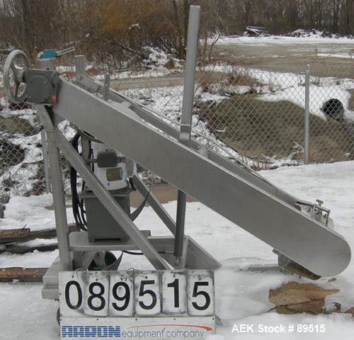 Used Sterling Fleischman Hydraulic Drum Dumper, 304 Stainless Steel. Approximate 750 pound capacity. 3/4 hp, 1/60/115/230 volt, 1725 rpm motor. Manual hand crank drum tilt. Unit mounted on casters.