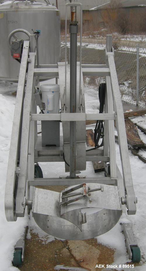 Used Sterling Fleischman Hydraulic Drum Dumper, 304 Stainless Steel. Approximate 750 pound capacity. 3/4 hp, 1/60/115/230 volt, 1725 rpm motor. Manual hand crank drum tilt. Unit mounted on casters.