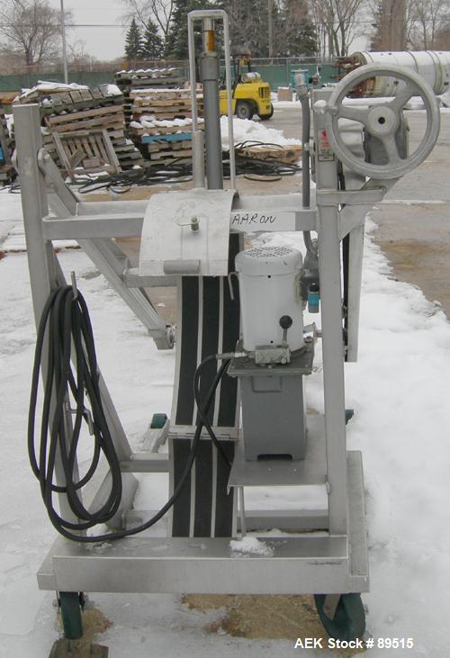 Used Sterling Fleischman Hydraulic Drum Dumper, 304 Stainless Steel. Approximate 750 pound capacity. 3/4 hp, 1/60/115/230 volt, 1725 rpm motor. Manual hand crank drum tilt. Unit mounted on casters.