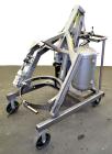 Used Drum Runner Material Handling Drum Lift-Carry-Rotate-Pour, Model 4600A-H, carbon steel, 800 pound drum capacity.  Air lift and tilt with holding tank.  Designed for plastic, steel, and fiber dru...