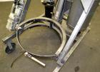 Used Drum Runner Material Handling Drum Lift-Carry-Rotate-Pour, Model 4600A-H, carbon steel, 800 pound drum capacity.  Air lift and tilt with holding tank.  Designed for plastic, steel, and fiber dru...