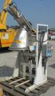 Used Material Transfer & Storage Lift and Dump Drum Discharger, Carbon Steel. 2 HP, 3/60/230/460 Volt, 1150 RPM hydraulic motor. 304 Stainless steel drum chute with a vortex air operated slide gate v...