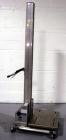 Used Vistil Manufacturing Company Lift, Model PEL-100-A/LS/HC, 125 lb / 57 kg capacity, 110V input, 24 VDC battery operated, serial number S305295, built 8/2005