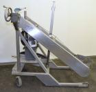 Used Sterling Fleischman Hydraulic Drum Dumper, 304 Stainless Steel. Approximate 750 pound capacity. 3/4 hp, 1/60/115/230 volt, 1725 rpm motor. Manual hand crank drum tilt. Unit mounted on casters.