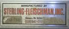 Used Sterling Fleischman Hydraulic Drum Dumper, 304 Stainless Steel. Approximate 750 pound capacity. 3/4 hp, 1/60/115/230 volt, 1725 rpm motor. Manual hand crank drum tilt. Unit mounted on casters.