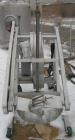 Used Sterling Fleischman Hydraulic Drum Dumper, 304 Stainless Steel. Approximate 750 pound capacity. 3/4 hp, 1/60/115/230 volt, 1725 rpm motor. Manual hand crank drum tilt. Unit mounted on casters.