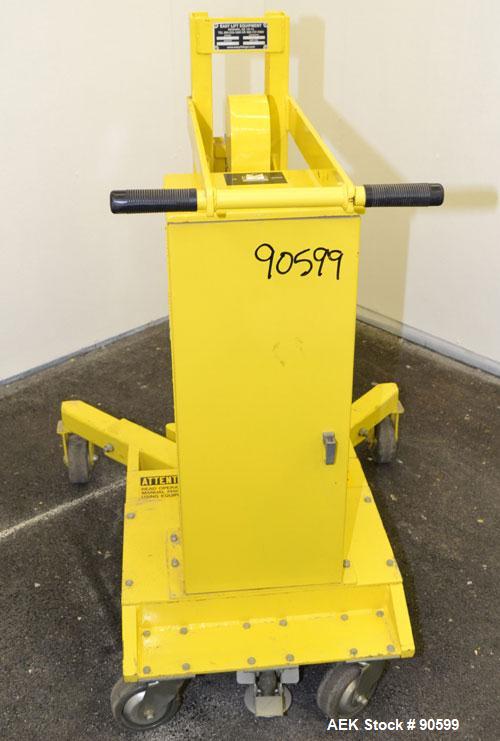 Used Easy Lift Equipment Drum Transporter, Model EL600DC, Carbon Steel. Battery operated, 600 pound capacity. Lift height 20", 1" per stroke. Mounted on casters.