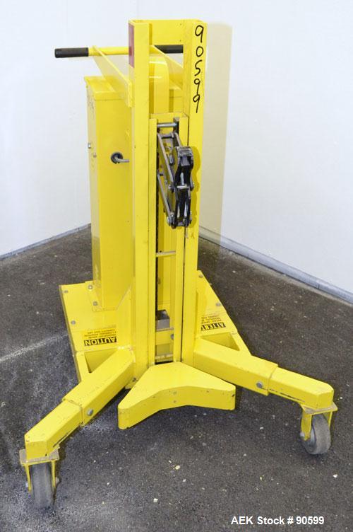 Used Easy Lift Equipment Drum Transporter, Model EL600DC, Carbon Steel. Battery operated, 600 pound capacity. Lift height 20", 1" per stroke. Mounted on casters.
