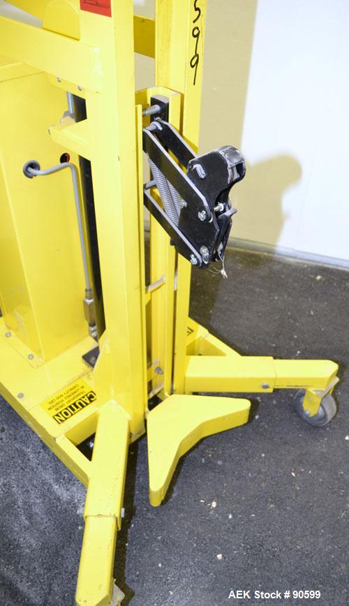 Used Easy Lift Equipment Drum Transporter, Model EL600DC, Carbon Steel. Battery operated, 600 pound capacity. Lift height 20", 1" per stroke. Mounted on casters.