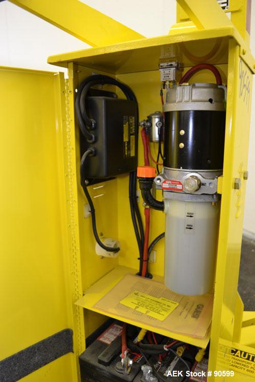 Used Easy Lift Equipment Drum Transporter, Model EL600DC, Carbon Steel. Battery operated, 600 pound capacity. Lift height 20", 1" per stroke. Mounted on casters.