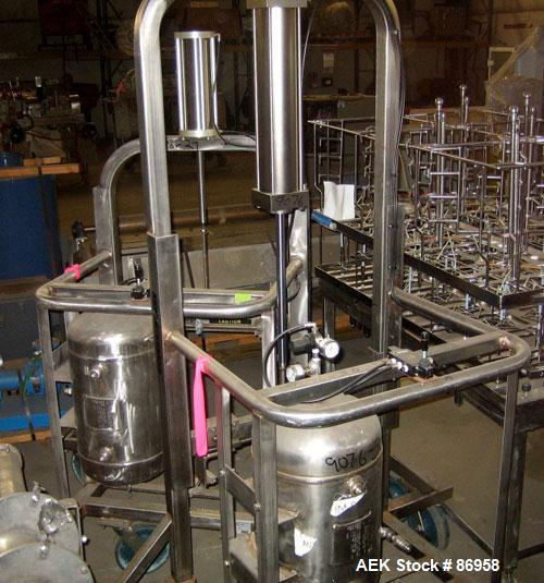 Used Material Handling Drum Runner, Model 5500 P/A, Stainless Steel. 1000 Pound drum capacity, air lift with tank. Drum height 29" to 36". Mounted on casters.
