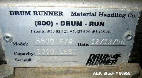Used Material Handling Drum Runner, Model 5500 P/A, Stainless Steel. 1000 Pound drum capacity, air lift with tank. Drum height 29" to 36". Mounted on casters.