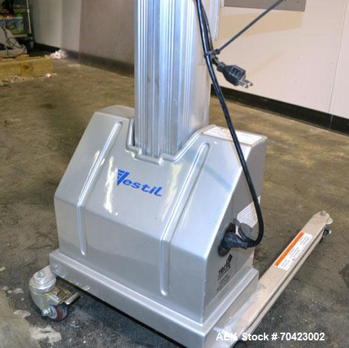 Used Vestil Manufacturing Model PEL-100-A/HC DC Powered Quick Lift Aluminum. Capacity 125 pounds. Raised height 72, lowered height 5-1/2. Operator control panel. Mounted on casters. Built 2006.