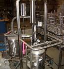 Used Material Handling Drum Runner, Model 5500 P/A, Stainless Steel. 1000 Pound drum capacity, air lift with tank. Drum height 29