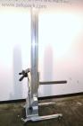 Used Vestil Manufacturing Model PEL-100-A/HC DC Powered Quick Lift Aluminum. Capacity 125 pounds. Raised height 72, lowered height 5-1/2. Operator control panel. Mounted on casters. Built 2006.