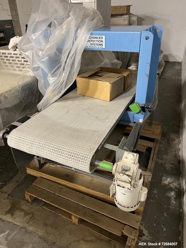 Used Advanced Detection System Series 9100 Large Aperture Metal Detector. Machine was designed to sense particles between 0.250"  0.500" (6.25mm-12.5mm) in size, aperture is approximate 24" wide x 12...