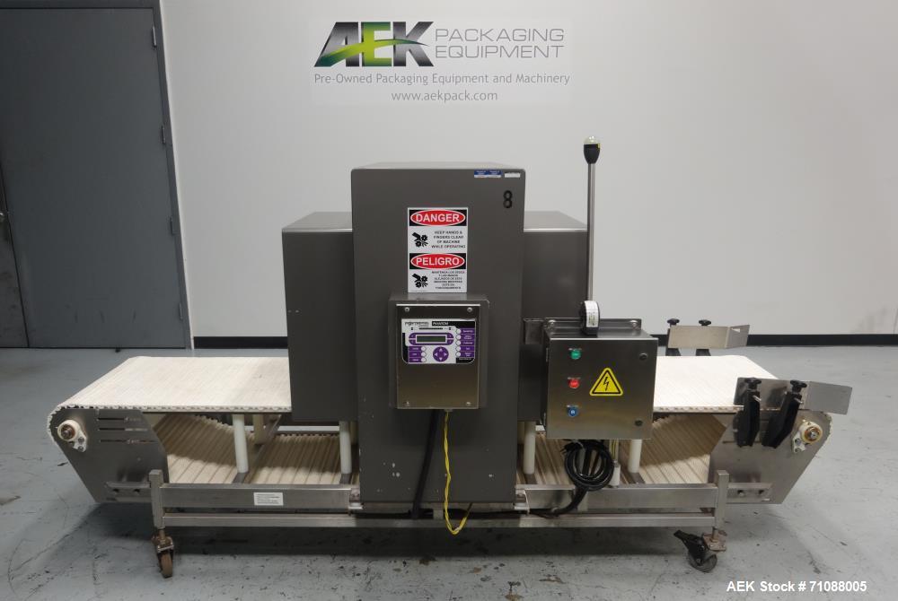 Used Fotress Phantom Big Bag Metal Detector. serial #I-17282, 26" x 24" aperature. Sensitivity: detection of 1.4 - 2.0 mm stainless steel and 0.9 - 1.5mm Ferrous. Includes mesh belt conveyor Model SC...