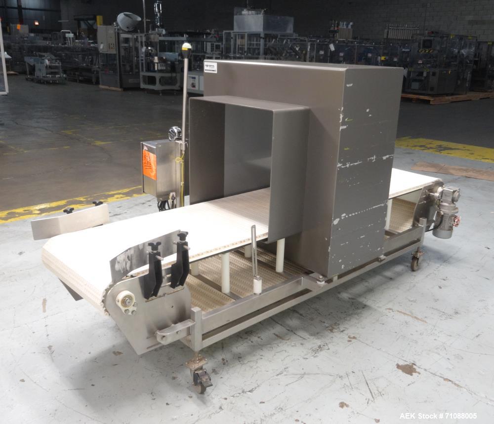 Used Fotress Phantom Big Bag Metal Detector. serial #I-17282, 26" x 24" aperature. Sensitivity: detection of 1.4 - 2.0 mm stainless steel and 0.9 - 1.5mm Ferrous. Includes mesh belt conveyor Model SC...